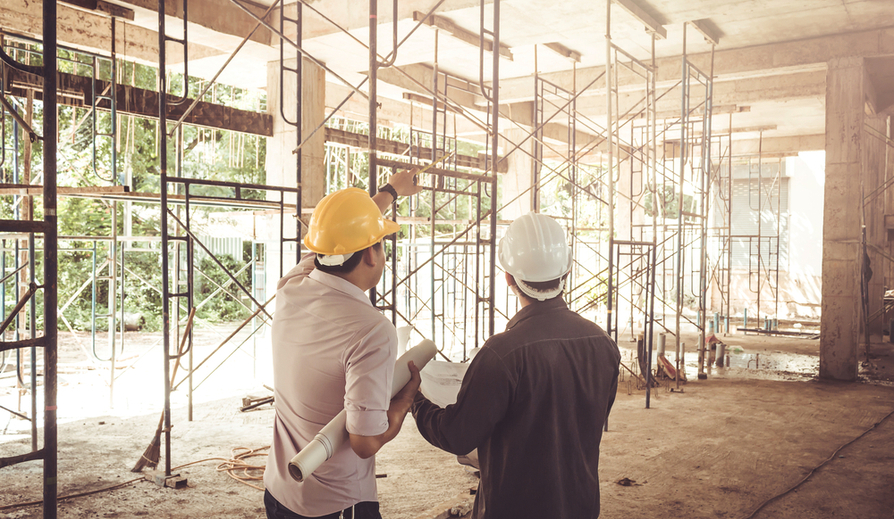 property development site funded by bridging finance with workers